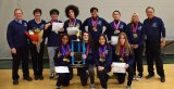 Front row: Andrea Rozier, Luna Wheaton, Jessica-Ann Villa, Clarissa (Chloe) Morgan. Back row: Coaches John and Janet Bengtson, Nazareth Franco, Rowe Boatman, Richard (Isaac) Harmiel, Christian Pimentel, Isabella Escobedo, Coach Allen Tong.